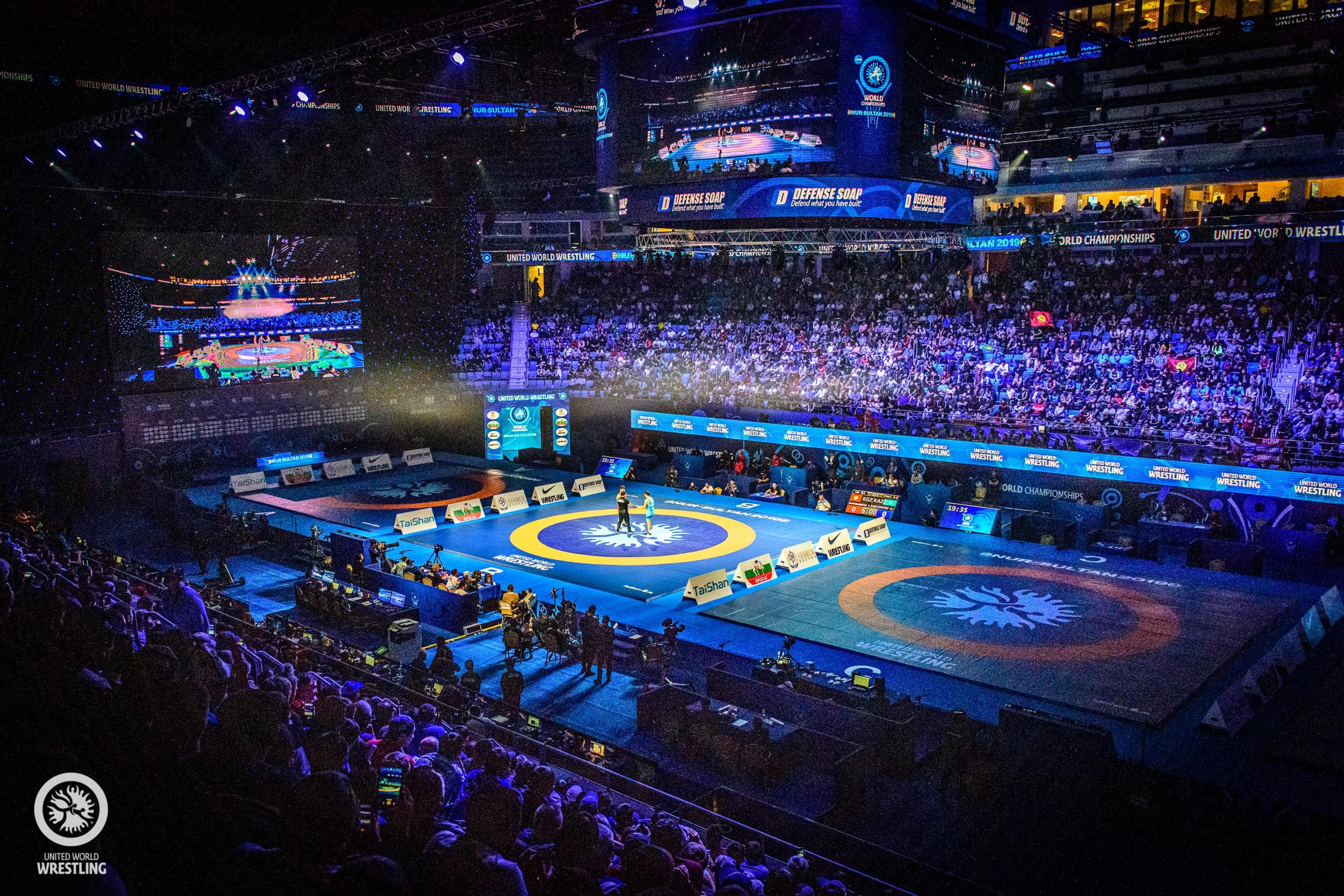 World-level wrestling arena during a live international event